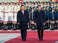 Chinese President Xi Jinping holds a welcoming ceremony for French President Emmanuel Macron