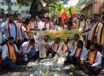 Kannada activists throw Amul products to street, stage protest in B'luru, warn they won't allow Amul to sell.