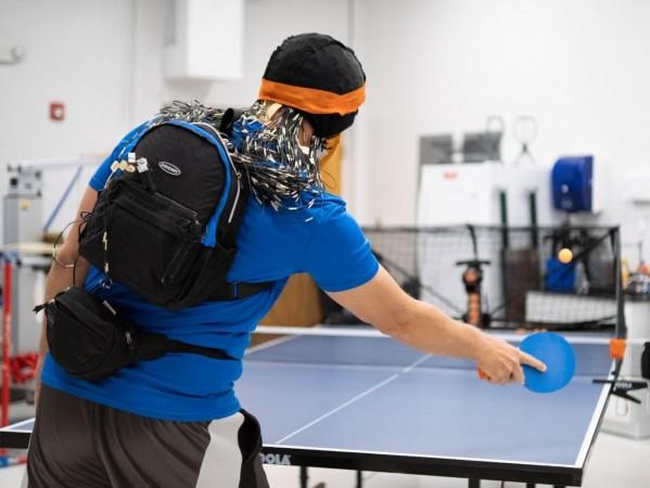 Playing sports against a robotic opponent can make your brain work harder.