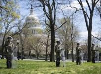 Washington: U.S. National Guard members stand guard in front of the U.S. Capitol building in Washington, D.C., the United States, on April 2, 2021.