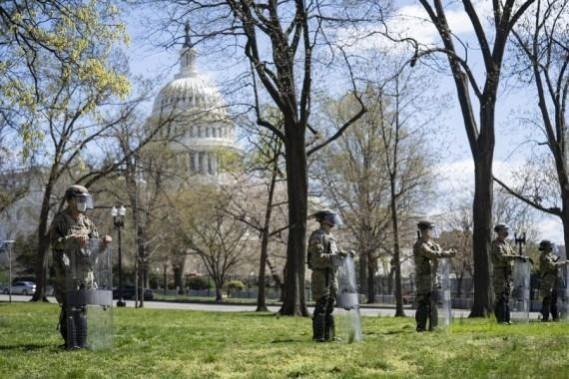 Washington: U.S. National Guard members stand guard in front of the U.S. Capitol building in Washington, D.C., the United States, on April 2, 2021. Washington: U.S. National Guard members stand guard in front of the U.S. Capitol building in Washington, D.C., the United States, on April 2, 2021.