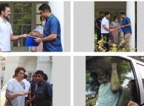 Congress leader Rahul Gandhi hands over the key of 12, Tughlak Lane bungalow to the officials as he vacates the bungalow after his disqualification as a Lok Sabha MP in New Delhi on Saturday, April 22, 2023