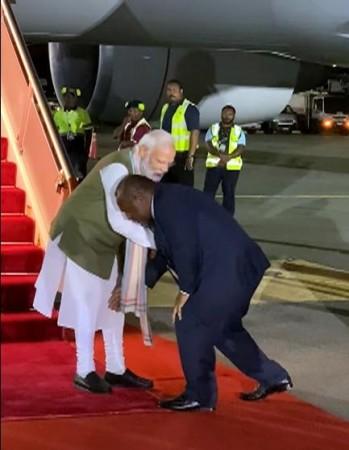 Papua New Guinea PM touches PM Modi's feet Papua New Guinea PM touches PM Modi's feet
