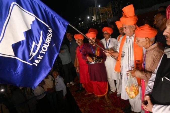 Lieutenant Governor Manoj Sinha flagging off first batch of Amarnath Yatris from Jammu on Friday. Amarnath Yatra