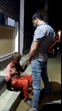 The video from Madhya Pradesh's Sidhu district, which has since gone viral, has drawn flak from netizens, who have demanded strict action for the inhumane and vile act. The video from Madhya Pradesh's Sidhu district, which has since gone viral, has drawn flak from netizens, who have demanded strict action for the inhumane and vile act.