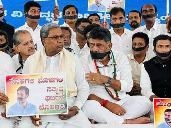 K'taka Cong On Silent Protest In B'luru Against BJP's 'Conspiracy' To End Rahul's Career K'taka Cong On Silent Protest In B'luru Against BJP's 'Conspiracy' To End Rahul's Career