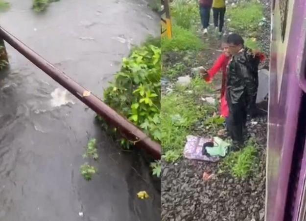 Shocker: Infant slips out of man's arms, washed away in flooded Thane drain Shocker: Infant slips out of man's arms, washed away in flooded Thane drain