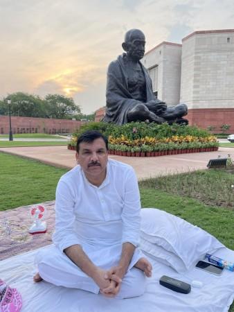 AAP's Sanjay Singh continues sit-in protest in Parliament premises.(Photo:@SanjayAzadSln/Twitter) Sanjay Singh
