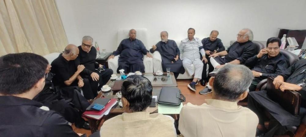 Opposition leaders in black at a meeting in parliament Opposition leaders