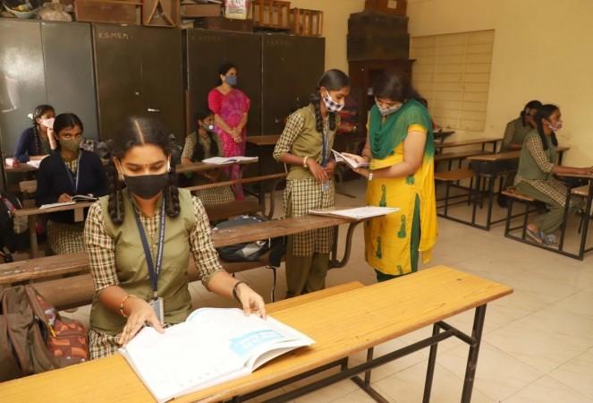 Representational Picture of Bengaluru students attending classes at a Government school as schools reopened after a gap of nine months amid COVID-19 safety measures, in Bengaluru on Jan 1, 2021. (Photo: IANS) students