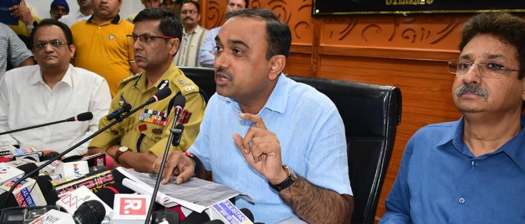 Divisional Commissioner Jammu Ramesh Kumar along with ADGP Jammu zone Mukesh Singh addressing media persons Div Comm Jammu