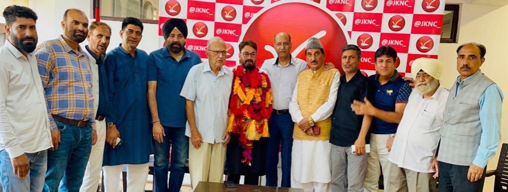 NC leaders welcoming Sameer Iqbal Bhat who rejoined the party. Sameer Iqbal Bhat