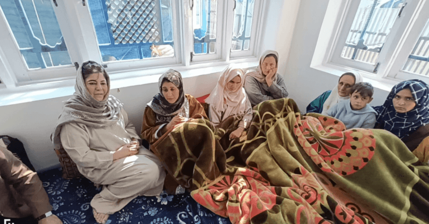 Mehbooba Mufti with family members of head constable Ghulam Mohammad Dar Mehbooba Mufti