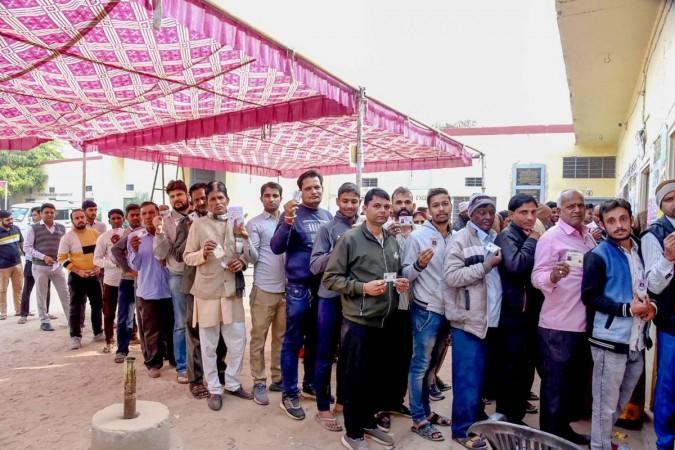 Jaipur : Voters stand in a queue to cast their votes for the Rajasthan Assembly Elections 2023 at Bassi in Jaipur on Saturday, November 25, 2023. (Photo: IANS/PIB) Voting in Rajasthan