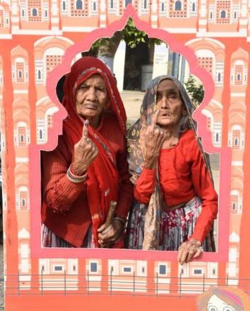 Jaipur : Voters stand in a queue to cast their votes for the Rajasthan Assembly Elections 2023 at Bassi in Jaipur on Saturday, November 25, 2023. (Photo: IANS/PIB) Rajasthan