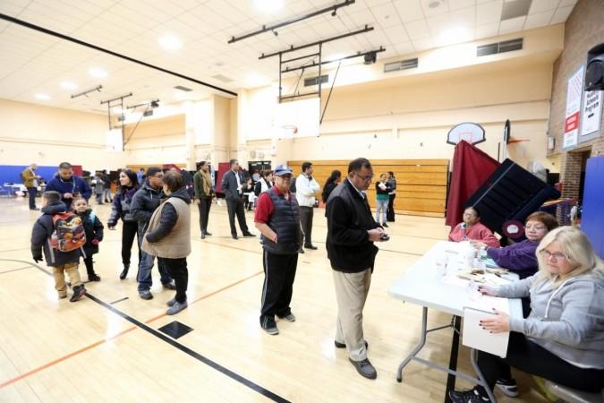 (File) Jersey City: An Indian Americans voter cast vote in the quadrennial U.S. presidential elections in Jersey City, US on Nov. 8, 2016. (Photo: Mohammed Jaffer/IANS) voting