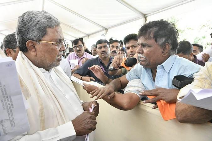 Bengaluru: Karnataka CM Siddaramaiah Interacts With People During The 'Janta Darshan' Bengaluru: Karnataka CM Siddaramaiah Interacts With People During The 'Janta Darshan'