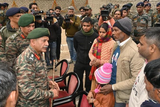 General Officer Commanding-in-Chief, Northern Command, Lt Gen Upendra Dwivedi interacting with the next of kin of the slain soldiers at the wreath-laying ceremony. Homage to martry soldiers