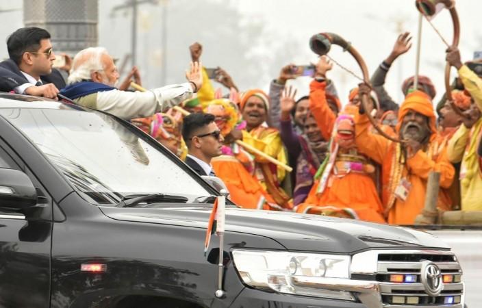 Ayodhya : Prime Minister Narendra Modi Waves Toward Supporters During A Roadshow modi