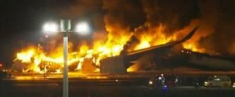 Japan Airlines plane catches fire at Tokyo airport; all 379 passengers, crew escape