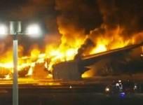 Japan Airlines plane catches fire at Tokyo airport; all 379 passengers, crew escape