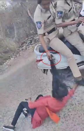 NHRC Notice To T'gana Over Woman Cop Dragging Girl Student By Hair NHRC Notice To T'gana Over Woman Cop Dragging Girl Student By Hair
