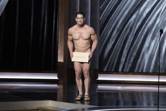 John Cena bares it all, covers his modesty with envelope at Oscars 2024 stage John Cena bares it all, covers his modesty with envelope at Oscars 2024 stage