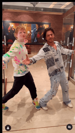 Ed Sheeran strikes SRK's signature pose with the actor. Ed Sheeran strikes SRK's signature pose with the actor.