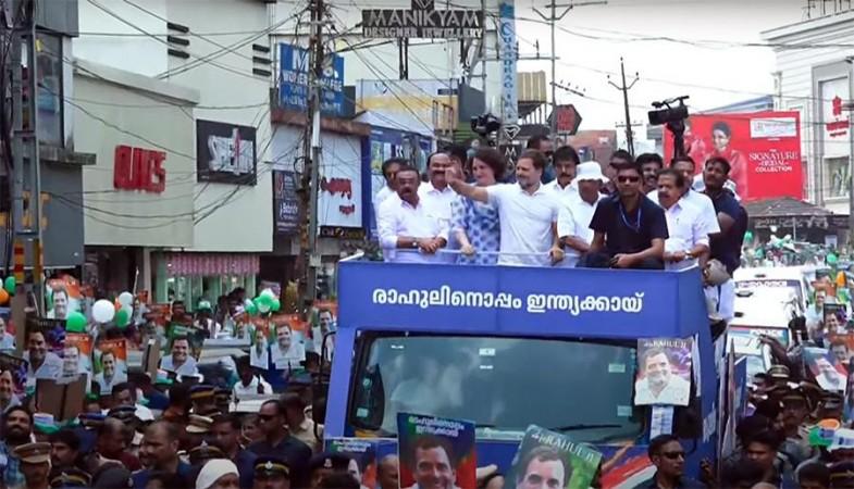 Wayanad: Congress Candidate Rahul Gandhi With Party Leaders Priyanka Gandhi And K.C. Venugopal During A Road Show Before Filing His Nomination Papers For The Upcoming Lok Sabha Elections. Wayanad: Congress Candidate Rahul Gandhi With Party Leaders Priyanka Gandhi And K.C. Venugopal During A Road Show Before Filing His Nomination Papers For The Upcoming Lok Sabha Elections Wayanad: Congress Candidate Rahul Gandhi With Party Leaders Priyanka
