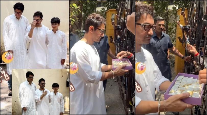 Aamir Khan poses with sons Junaid, Azad at his residence; distributes sweets to paps Aamir Khan poses with sons Junaid, Azad at his residence; distributes sweets to paps