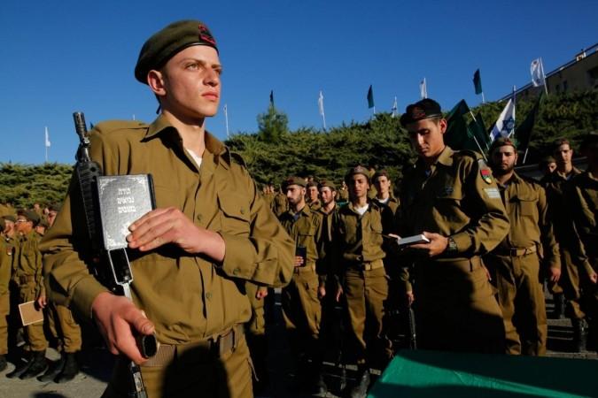 (File Photo) LATRUN, Jan. 11, 2018 (Xinhua) -- Israelis attend a swearing-in ceremony to join the Israel Defence Forces at Latrun army base, on Jan. 11, 2018. (Xinhua/Gil Cohen Magen/IANS) Israelis attend a swearing-in ceremony