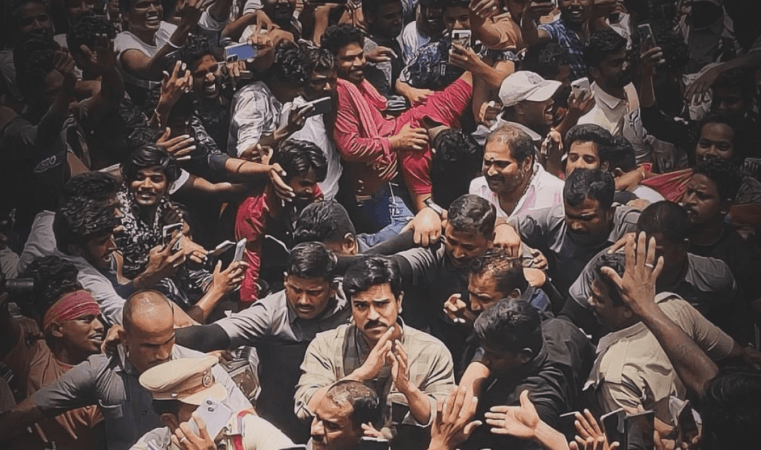 Ram Charan's visit to Pithapuram turns chaotic; fans pull shirt and ...