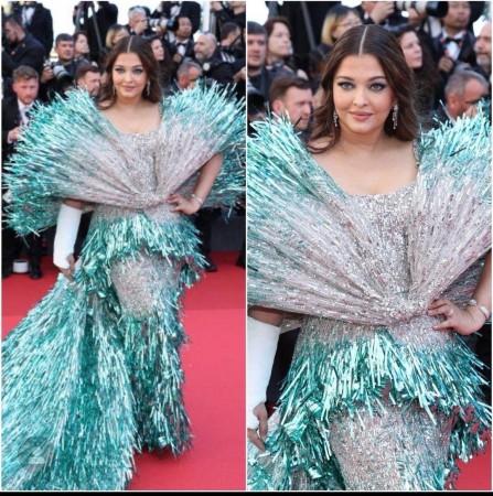 'Is there a theme, kids birthday party?': Aishwarya Rai Bachchan's double-shaded gown in green and silver on day 2 at Cannes disappoints fans 'Is there a theme, kids birthday party?': Aishwarya Rai Bachchan's double-shaded gown in green and silver on day 2 at Cannes disappoints fans