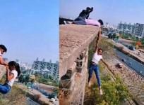 Girl dangles mid-air for reel, Pune Police nab 2 for daredevil stunt
