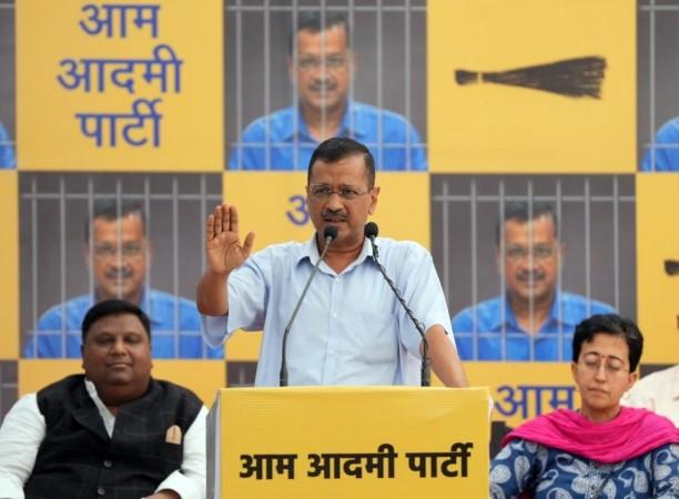 Delhi CM and AAP national convener Arvind Kejriwal with Delhi ministers Atishi, Saurabh Bharadwaj, Kailash Gahlot and other AAP leaders during a pary workers meeting ahead of his surrender at the Tihar Jail