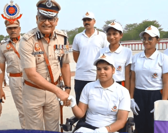 Delhi Police Spl. Commissioner Pathak with a new recruit at the Parade Delhi Police passing out parade 2
