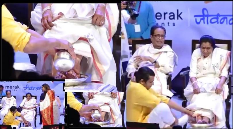 Sonu Nigam, kisses and washes veteran singer Asha Bhosle's feet at an event Sonu Nigam, kisses and washes veteran singer Asha Bhosle's feet at an event
