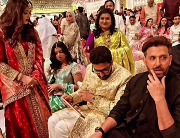 Abhishek Bachchan joined Aishwarya Rai, and Aaradhya during Ambani's wedding after posing with Big B and his family Abhishek Bachchan joined Aishwarya Rai, and Aaradhya during Ambani's wedding after posing with Big B and his family