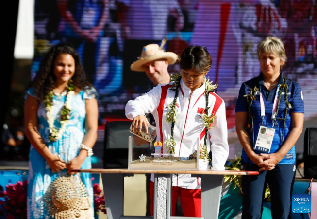 Surfing athletes celebrate opening ceremony in Tahiti Surfing athletes celebrate opening ceremony in Tahiti