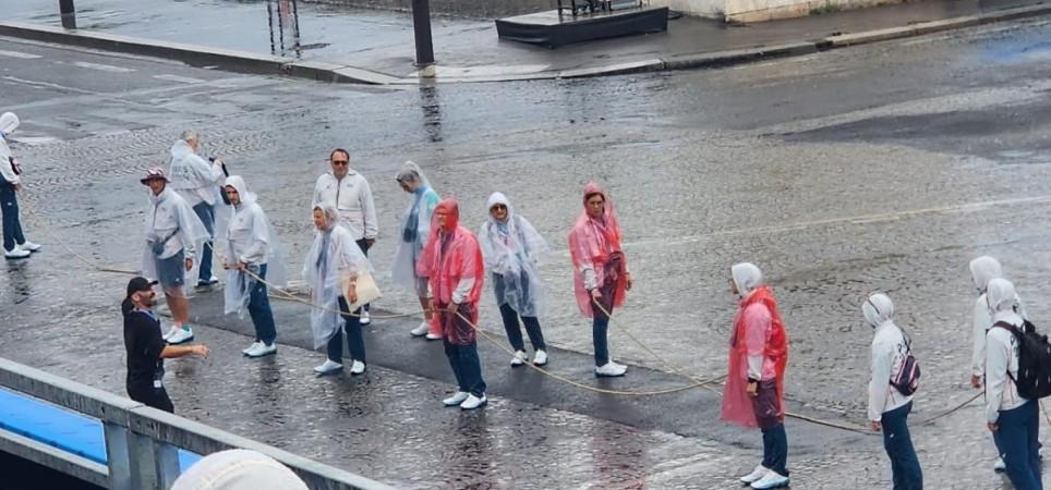 Rain plays hide & seek before Opening Ceremony of the 2024 Olympic Games in Paris on Friday. Rain plays hide & seek before Opening Ceremony of the 2024 Olympic Games in Paris on Friday.