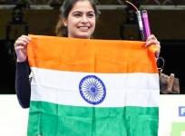 India's Manu Bhaker Poses For A Photograph With Her Bronze Medal At The 2024 Summer Olympics