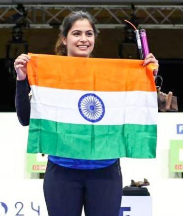 India's Manu Bhaker Poses For A Photograph With Her Bronze Medal At The 2024 Summer Olympics India's Manu Bhaker Poses For A Photograph With Her Bronze Medal At The 2024 Summer Olympics