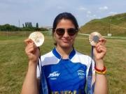 India's Manu Bhaker poses with her two bronze medals won at the Paris 2024 Olympics