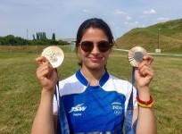 India's Manu Bhaker poses with her two bronze medals won at the Paris 2024 Olympics