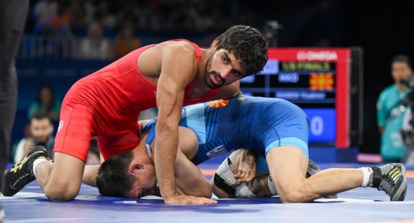 India's Aman Sehrawat goes for bronze India's Aman Sehrawat and North Macedonia's Vladimir Egorov compete in the round of 16 of the men's freestyle 57kg wrestling match