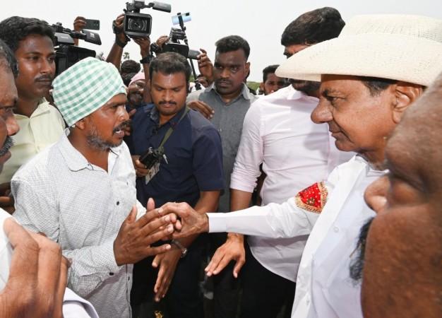 Bharat Rashtra Samithi (BRS) President K Chandrashekar Rao interacts with farmers during a visit to drought-hit areas of Mugdhumpur Bharat Rashtra Samithi (BRS) President K Chandrashekar Rao interacts with farmers during a visit to drought-hit areas of Mugdhumpur