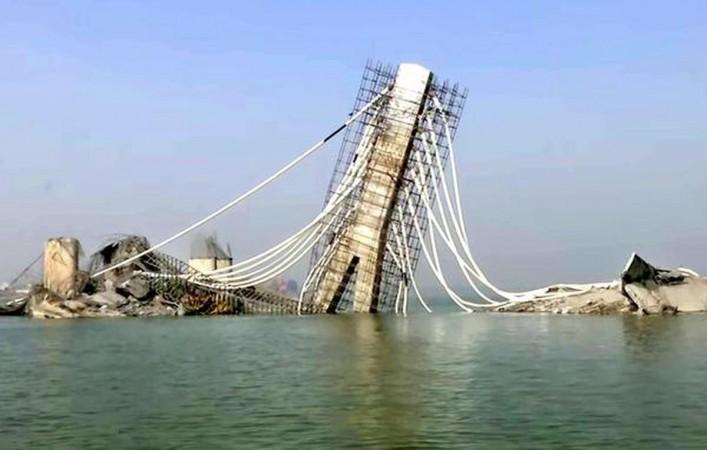 Section of Bihar's under construction Sultanganj-Aguwani Ghat bridge falls into Ganga yet again Section of Bihar's under construction Sultanganj-Aguwani Ghat bridge falls into Ganga yet again