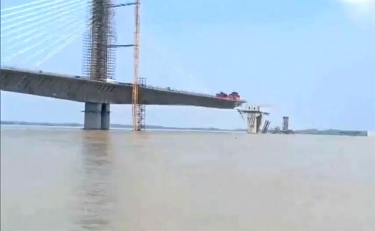 An under-construction Sultanganj-Aguwani Ghat bridge collapsed due to rising Ganga water levels An under-construction Sultanganj-Aguwani Ghat bridge collapsed due to rising Ganga water levels