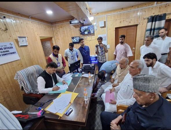 NC candidate Mohammad Khalil filing his papers in the presence of party president Dr. Farooq Abdullah Mohammad Khalil Band