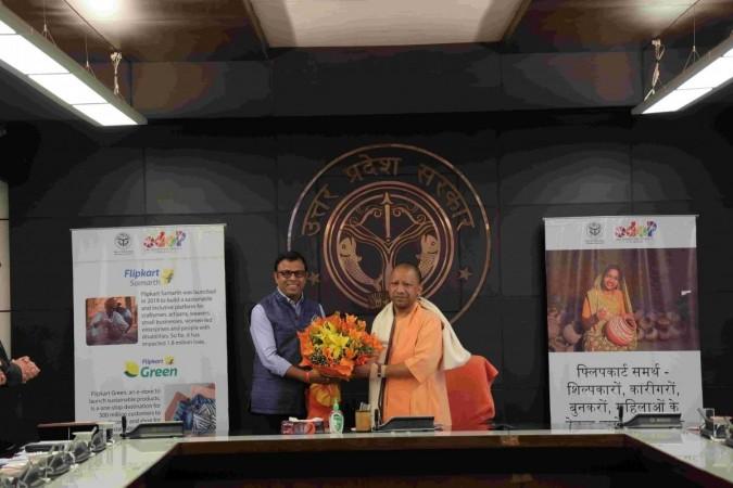 Rajneesh Kumar, Chief Corporate Affairs Officer, Flipkart Group; and Yogi Adityanath, Chief Minister of Uttar Pradesh at the virtual launch of Flipkart's two new fulfillment centers in Uttar Pradesh (at Unnao and Varanasi)